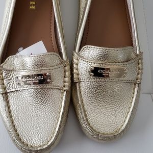 COACH gold loafers